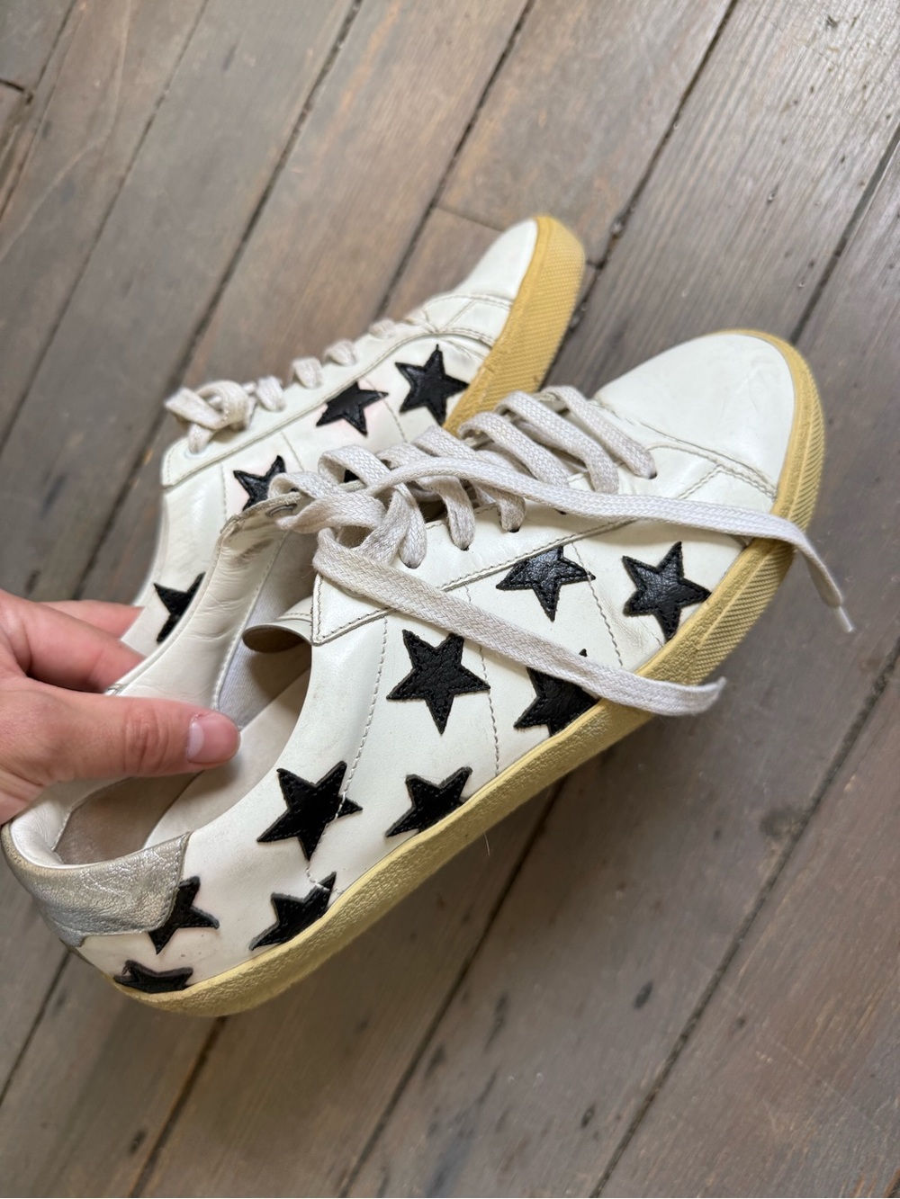 Saint Laurent White Sneakers with Black Star Accents